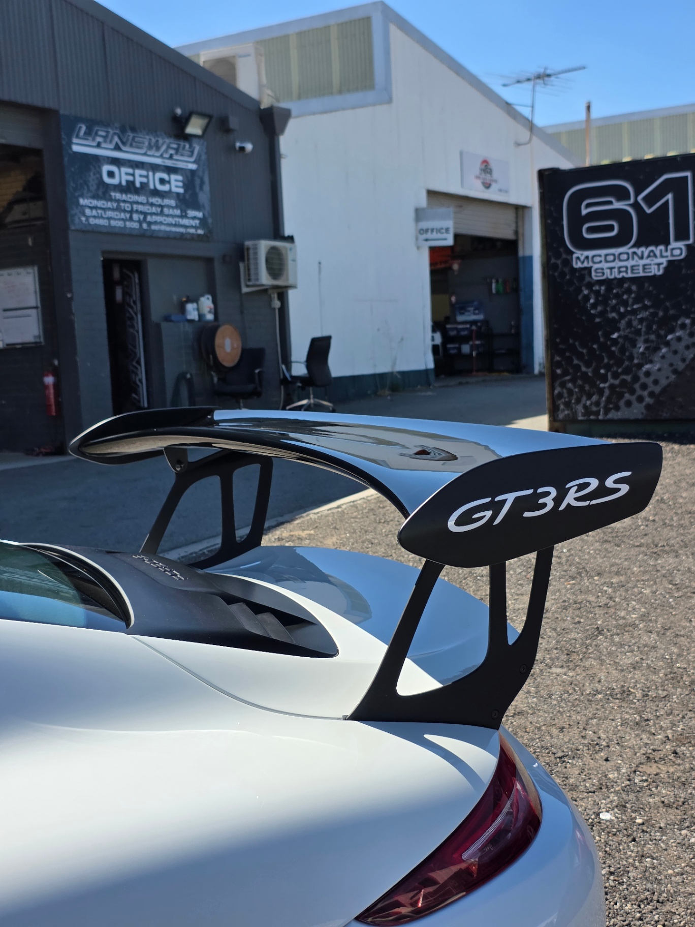 Porsche GT3 RS rear wing detail with the GT3RS badge