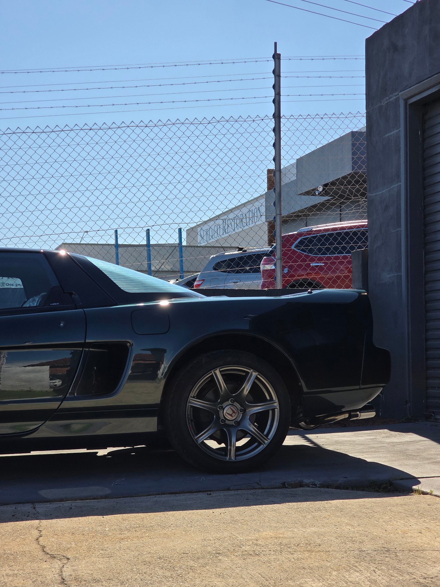 Black Honda NSX side profile