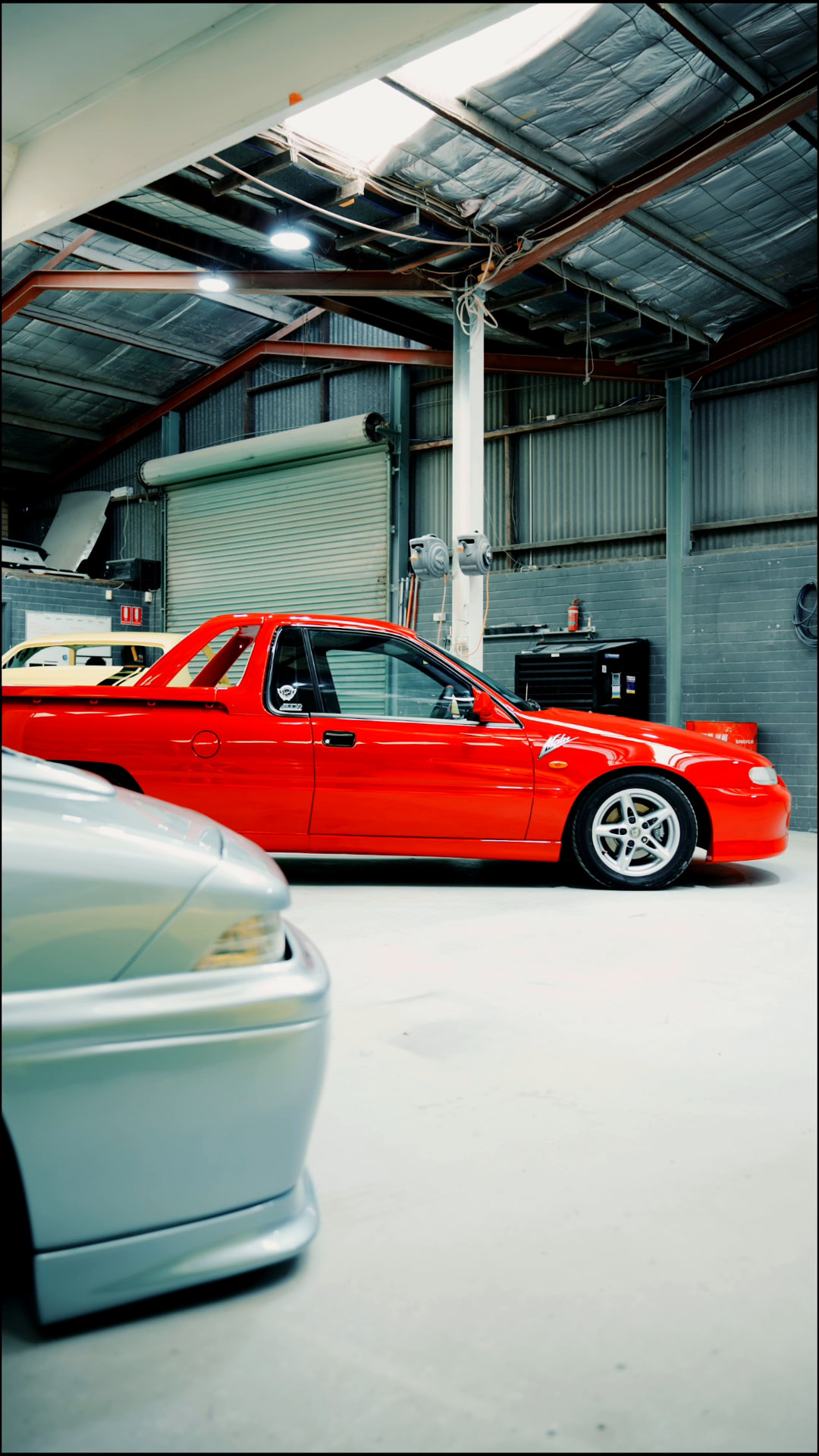 Red ute inside the Laneway workshop